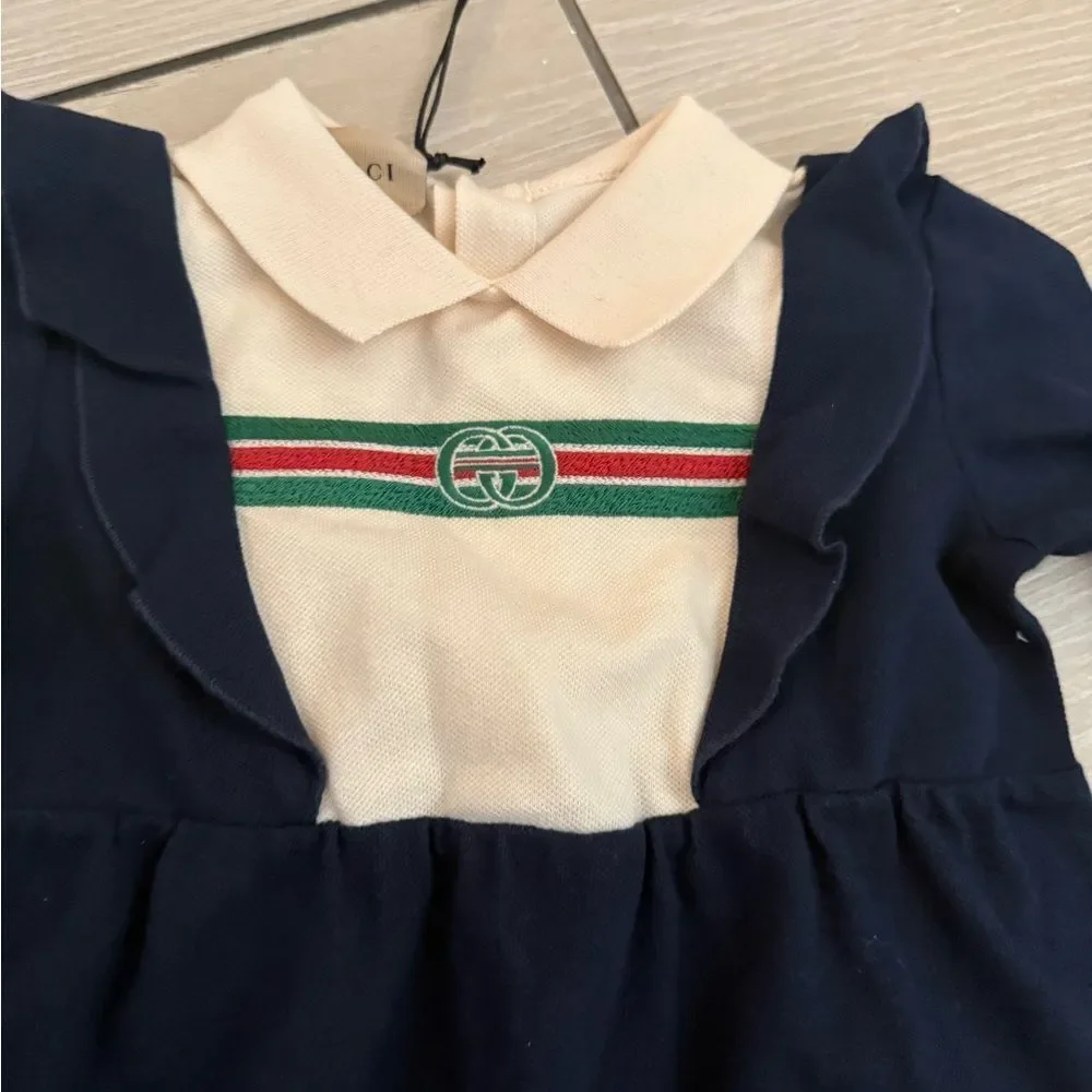 Brand new baby Gucci navy Footies One Piece